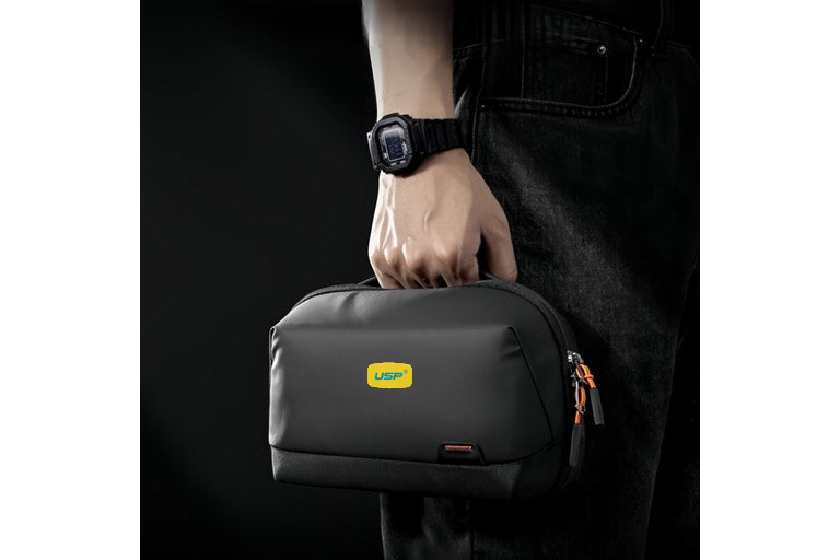 USP electronics organizer travel bag carried by hand